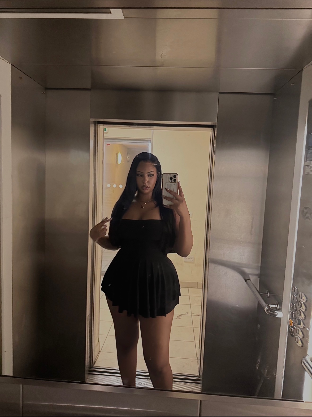 Raqia in a black dress